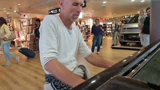 Airport Piano spontaneous improvisation  Mitsch Kohn intuitive music in Tallinn Estonia [upl. by Moulden]