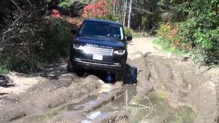 Through a mud pit with the 2014 Range Rover Supercharhed [upl. by Dlanod977]