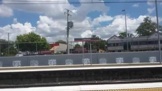 Rockhampton Tilt Train plus EMU6552 passing Lawnton Station 332017 [upl. by Kcirde]