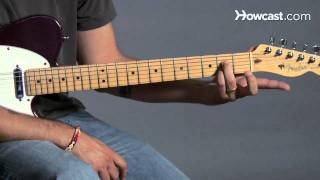 How to Play a C7 Barre Chord  Guitar Lessons [upl. by Xirdnek]