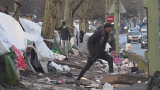 Thousands of asylum seekers waiting in streets makeshift camps around Paris [upl. by Rysler341]