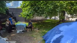 Illegal immigrants living on the green Park Lane mose experience part of London pulled knife [upl. by Dadivitan]