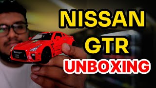 Nissan GTR R35 Unboxing  Diecast scale 132 [upl. by Enuj]