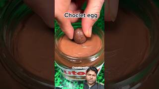 Chocolate egg dipped into nuttela satisfying nutella chocolate funny food shorts [upl. by Hgielrak]