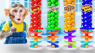 Monkey Challenges with Yummy Candy Dispenser Vending Machine  MONKEY ZYLO [upl. by Llenreb]