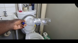 How To Unblock Clogged Toilet using Plastic Bottle  No plunger Needed DIY [upl. by Gusti]