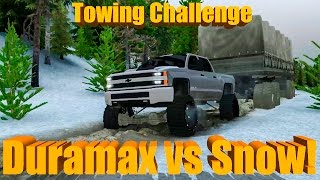 Spin Tires  LIFTED Duramax vs SNOW MAP towing QUAD AXLE Trailer [upl. by Hartley]