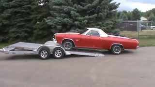 Aluma 8218 Tilt Tandem Axle Utility Trailer Loading El Camino [upl. by Cathlene]