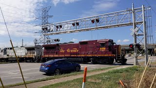 HMCR 8527 and HMCR 8560 pull 15 Covered Hoppers North Across Airport Road [upl. by Zetrom]