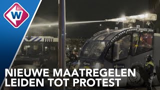 Lawaaiprotest en waterkanon bij coronapersconferentie  OMROEP WEST [upl. by Ateekahs293]