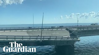 Crimea bridge appears damaged amid reports of explosions [upl. by Emalia535]