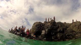 Waimea Bay North Shore  Cliff jumps and swimming under rock cave [upl. by Marcellina458]