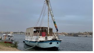 Viewing traditional sailboats in river Nile in Egypt Authentic Lateen rigged craft [upl. by Arretak]