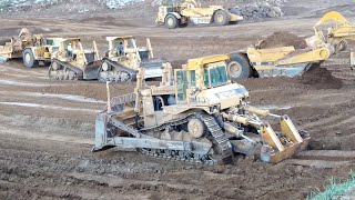 CAT D10N Dozers and 651E scrapers at work  Massive earth moving [upl. by Ibot]