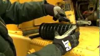 Cutting Open and Inspecting a Cat® Oil Filter [upl. by Brockie]