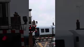 SWR Class 450 at Brockenhurst Level Crossing [upl. by Laureen]