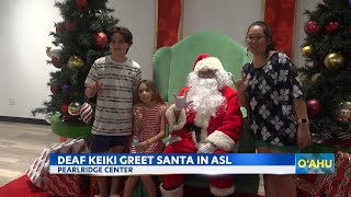 Santa signs ASL for deaf keiki at Pearlridge Center [upl. by Charbonnier374]