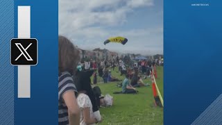 Navy parachutist lands on 2 spectators injuring them [upl. by Urbas]