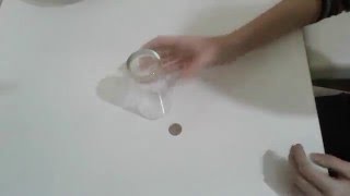 Magic trick Glass and disappearing coin [upl. by Shepley881]