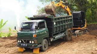 CAT 3055E2 Mini Excavator Loading Old Dump Truck Mitsubishi Colt Diesel T200 [upl. by Aneek64]