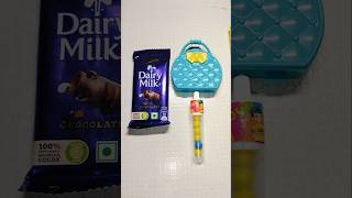 Dairy milk Chocolate or Gems ChocolatPopsicle youtubeshorts viralvideo [upl. by Frolick502]