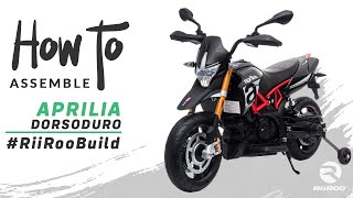 Aprilia Dorsoduro 900 Licensed Motorbike 12v Kids Electric Ride On Bike Assembly Instructions [upl. by Udella]