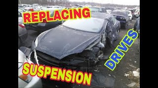 Rebuilding a Wrecked Tesla P85D bought at auction  Part 3 [upl. by Ailadi]