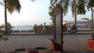 coffee at the Mizingani Seafront Hotel Sunset time Stone Town Zanzibar [upl. by Tirreg]