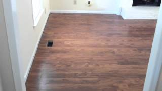 Laminate flooring flowing between rooms without a Tmolding [upl. by Eelimaj959]