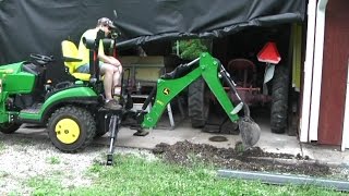 73 John Deere 1025R  Brians Backhoe Drainage Project  DIY [upl. by Ennayoj]