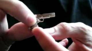 Smallest Automatic Hand Gun in the World Watch it FireSee to Believe Handgun by Roy Dawson video [upl. by Lilas]