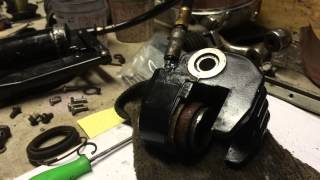 Removing Seized Caliper Piston  Grease Gun Trick [upl. by Gunter206]