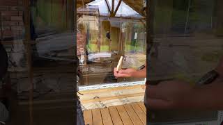 installation of a window using a wooden wedge [upl. by Yemiaj]