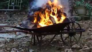 HOW TO BUILD A PORTABLE FIRE PIT  FROM ANTIQUE WHEEL BARREL MUST SEE WOW [upl. by Darian]