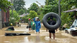 Myanmar residents flee severe floods shelter in a school  AFP [upl. by Wycoff]