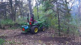 John Deere 3038E Tractor amp Grapple  Clearing underbrush [upl. by Selimah20]