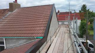 Sealing a roof with coping covers to prevent damp penetrating the walls [upl. by Duffy644]