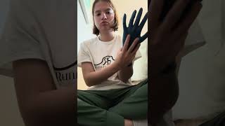 Putting on thick dark blue exam gloves nitrile [upl. by Letitia]