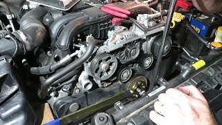 How to Replace the Timing Belt and Water pump Subaru 25L Part 1 Tear Down [upl. by Gonroff]