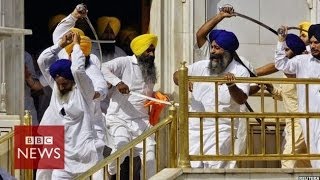 Sikh groups clash with swords at Indias Golden Temple  BBC News [upl. by Haelhsa]