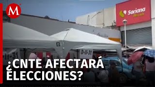 En Oaxaca maestros de la CNTE toman plazas comerciales [upl. by Dewhurst]