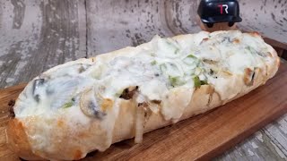 Philly Cheesesteak Stuffed French Bread Recipe you need this [upl. by Ardnuahs160]