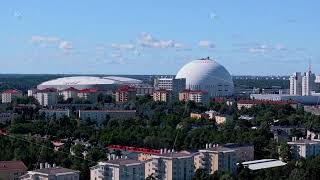 Aerial views showcase the iconic Globen Arena in Stockholm transitioning from day to night [upl. by Ethelda]