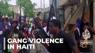 Haiti attack Armed groups kill at least 70 people in central [upl. by Darrick949]