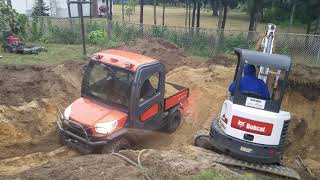 Kubota rtv x1100c being loaded with fill [upl. by Breeze]