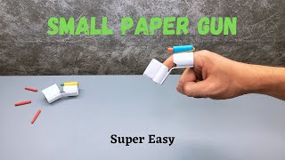 Make a Paper finger gun  Diy mini paper gun  Origami simple paper gun [upl. by Germain241]