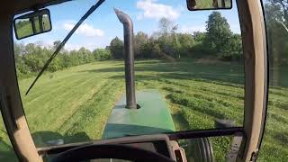 John Deere 7210 mowing 2nd cut grass hay [upl. by Annavoeg]