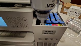 Filling the Epson EcoTank ET 3850 Wireless Color Supertank Printer with ink [upl. by Cailean]