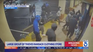 Suspects caught on video ramming government vehicle into storefront stealing merchandise [upl. by Bullis]