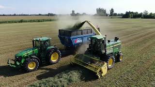 CANADIAN FARMER  SWISS FARMER SILAGE harvest John Deere Kuhn and Penta chip in to bring it home [upl. by Edouard669]